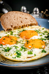 Fried eggs with a slice of bread