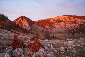 Obraz premium Scenic autumn landscape in Mehedinti Mountains, Carpathians, Romania, Europe. Fall alpine landscape in the mountains 