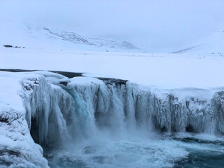 frozen waterfall in winter, Iceland