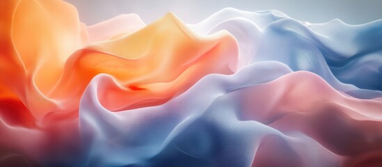 Obraz premium Abstract background with a soft, flowing fabric in blue, pink, and orange colors.