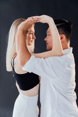 Man And Woman Dancing Together To Bachata Salsa Music