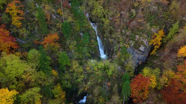 A soteska Pekel waterfall in the autumn, Slovenia, drone video, aerial footage
