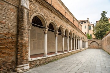 Fototapeta premium Historic brick wall with arches and columns, heritage, antique, traditional