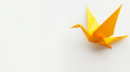 Elegant Yellow Origami Crane on a White Background