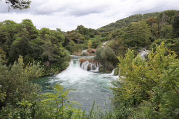 Waterfall on the Krka River on a cloudy day in Krka National Park, Croatia