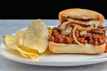 sloppy joe and onions  on a ciabatta roll