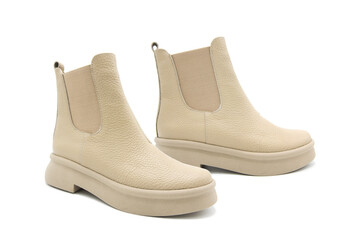 Fashionable leather boots isolated on white background. View from all sides.	