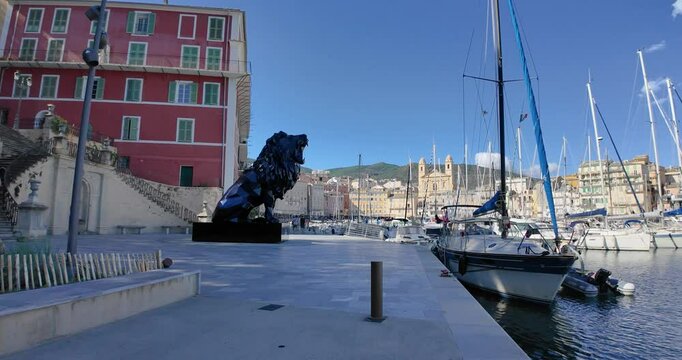 Scenic video of a walk along Bastia harbor under a bright blue sky