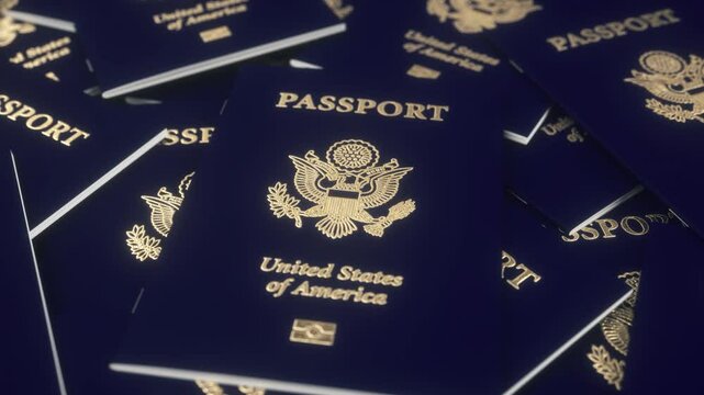 USA American passports on table. United States immigration, citizenship, travel and tourism concept