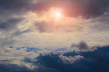 Skyscape with sun and beautiful clouds