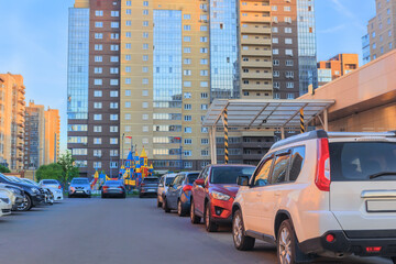 Cars parked in the courtyard of a residential building