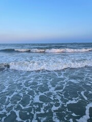 sunset waves on the beach