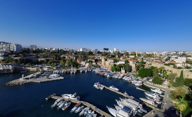 Naklejka premium Antalya Yivli Minaret, marina, sunset in the Mediterranean, Taurus Mountains, Antalya Clock Tower, historical and touristic places of Antalya city center