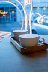 cup of coffee on a wooden table