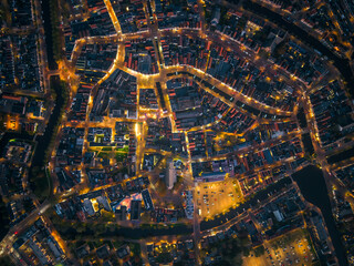 Topdown aerial night drone image of historic Frisian city of sneek