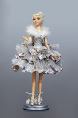 Ballerina statue for Christmas decor on gray gradient background