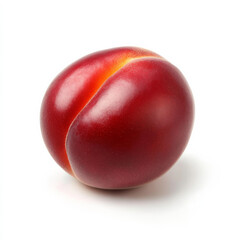 Obraz premium A single fresh nectarine, isolated on a white background, emphasizing a juicy stone fruit