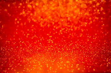 Orange bronze colorful shining glitter background Party concept Shimmering surface New year defocused bokeh Birthday Glowing texture Xmas template Glowing effect Copy space greeting text Holiday mood