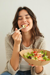 Woman Enjoying Fresh Salad Bowl Full of Colorful Healthy Vegetables
