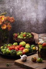 Making a delicious snack from unripe tomatoes.
