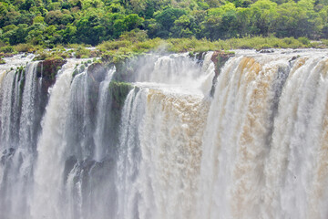 edge of a waterfall at Iguazu Falls, Misiones, Argentina