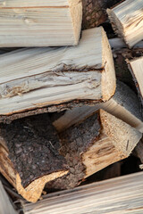 Stacked chopped wood for the winter as background
