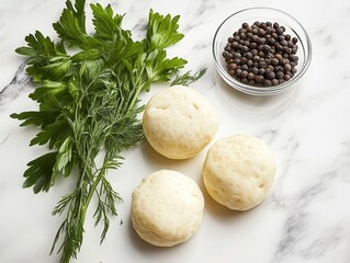 Fresh parsley, whole potatoes, black peppercorns on marble