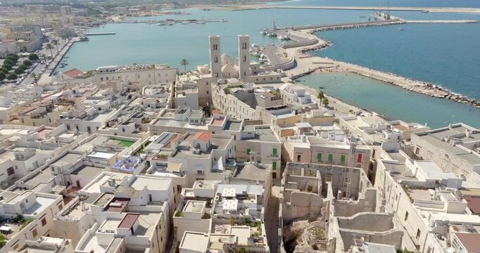 Aerial view of the church of San Corrado in Molfetta, in the province of Bari, Puglia, Italy. It is a Catholic place of worship located on the edge of the Old Town of the city, facing the port.