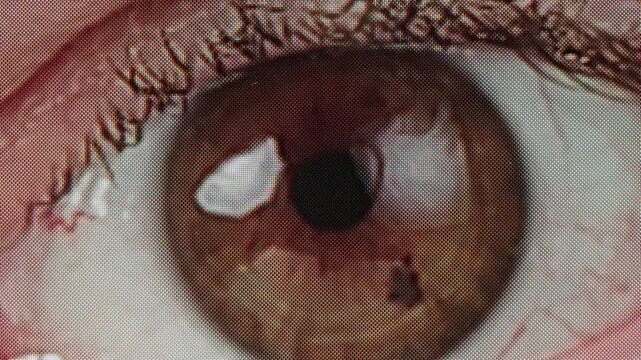 Close-up of green eyed woman with no make-up on face macro vhs retro tape pixel content. Blinking eye with long lashes. Beauty skin care make-up routine