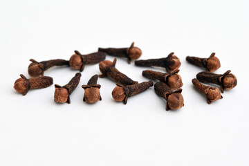 Dried cloves on a white background