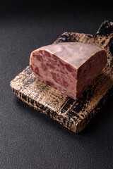 Homemade headcheese with salt, spices, herbs and vegetables