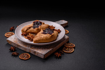 Sweet rye pies with cherries and chocolate