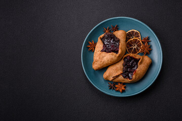 Sweet rye pies with cherries and chocolate