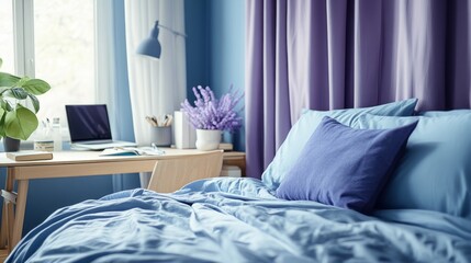 A Blue Bed with Purple Curtains and a Desk in the Background