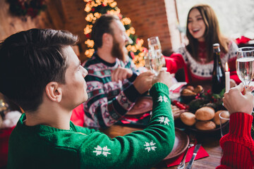 Portrait of friendly peaceful family sit table drink champagne gather celebrate new year xmas flat indoors