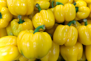 Top view of yellow peppers, food backgrounds
