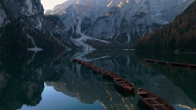 Lago di Braies in the morning, Dolomites, Italy, drone video, aerial footage