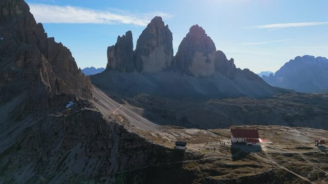 Tre Cime / Drei Zinnen mountain as seen from the refugio Locatelli, Dolomites, Italy, drone video, aerial footage