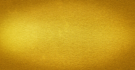 Golden textured background with a subtle gradient, ideal for luxury and elegant design projects. Golden textured background with a gradient, ideal for adding a touch of luxury to designs.