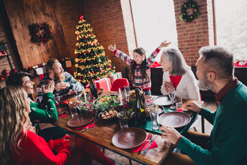 Portrait of friendly peaceful family chatting laugh gather celebrate new year xmas flat indoors
