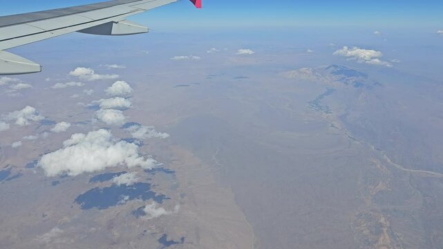 Aerial View of Hills and White Clouds Over Shahr-e Babak, Kerman Province, Iran