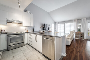 Inside and facade outside interior of modern renovated apartment flat in condominium in Brossard...
