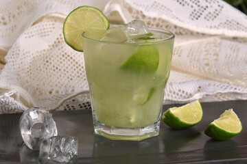 lemon drink, brazilian caipirinha refreshing and alcoholic citrus fruit drink