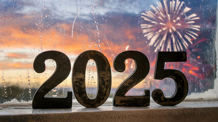 A photo of the year '2025' is displayed on window and the firework explosion in the background