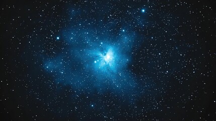 A stunning view of a blue nebula filled with stars, capturing the beauty and mystery of the cosmos.