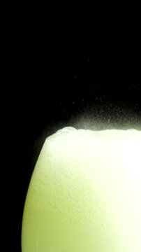 Foamy substance dissolving in water glass on bedstand fizzing poison in a glass 