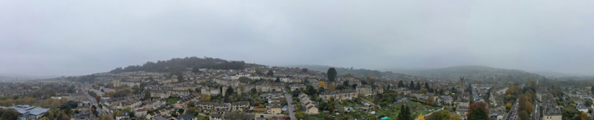 Fototapeta premium Aerial Panoramic View of Historical Walcot Bath City of England Which is Located in North East of Somerset, United Kingdom. High angle Footage Was Captured During Mostly Cloudy Early Morning
