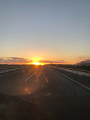 Asphalt road and mountain natural background at sunset, Mexico