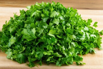 Obraz premium Freshly chopped parsley lies in a vibrant green pile on a wooden board, emphasizing its natural freshness and culinary appeal in a wholesome setting.