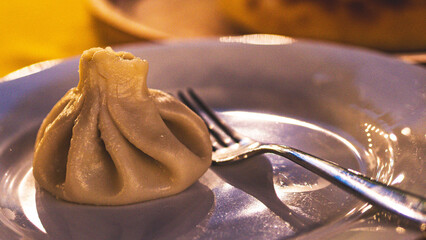 Traditional georgian food khinkali dumpling close up